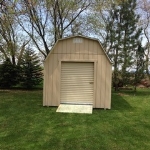 Roll up door with pressure treated ramp